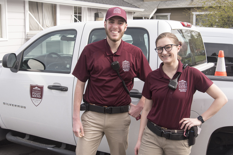 Security Services personnel with a security vehicle