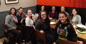 A gathering of people around a table