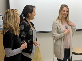 Three students giving an informational presentation