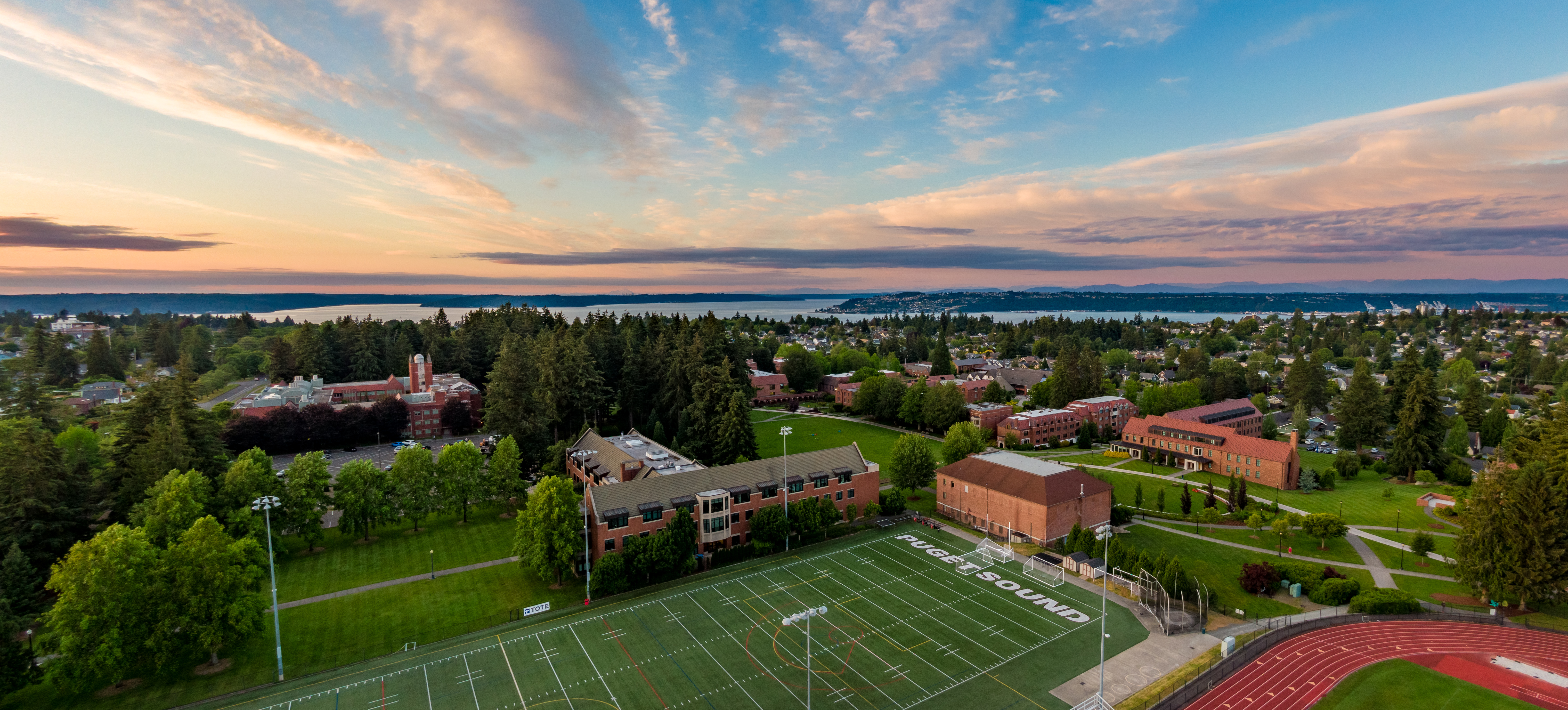 Aerial view of campus with Commencement Bay in the background