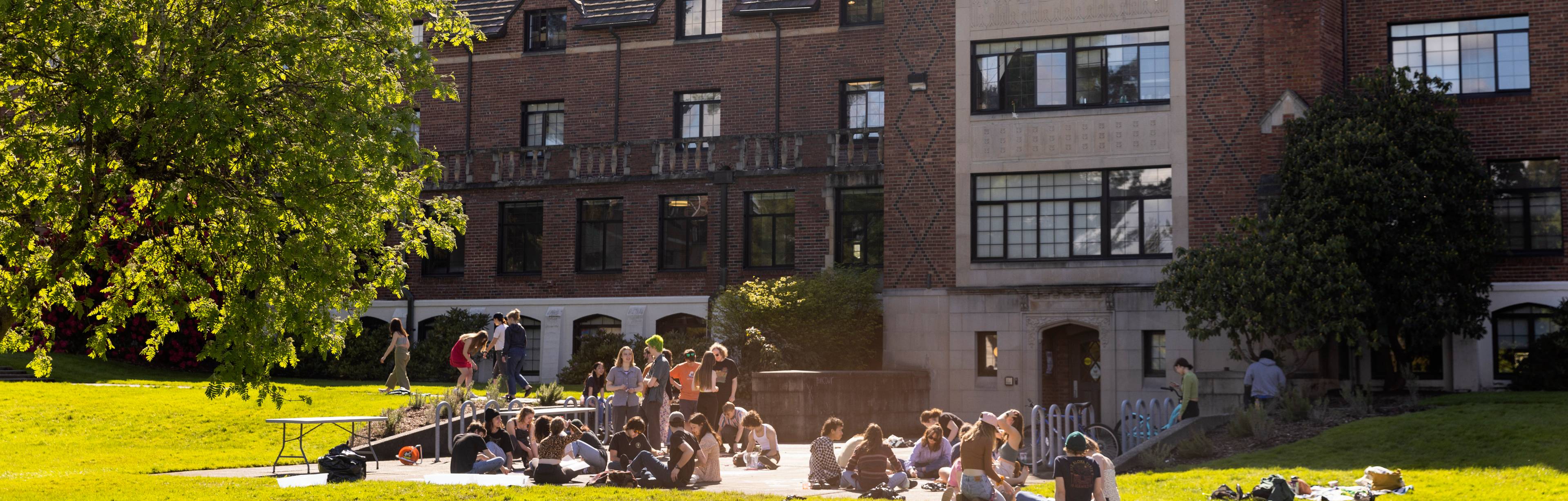 Students enjoying the sunshine outside Anderson-Langdon Hall