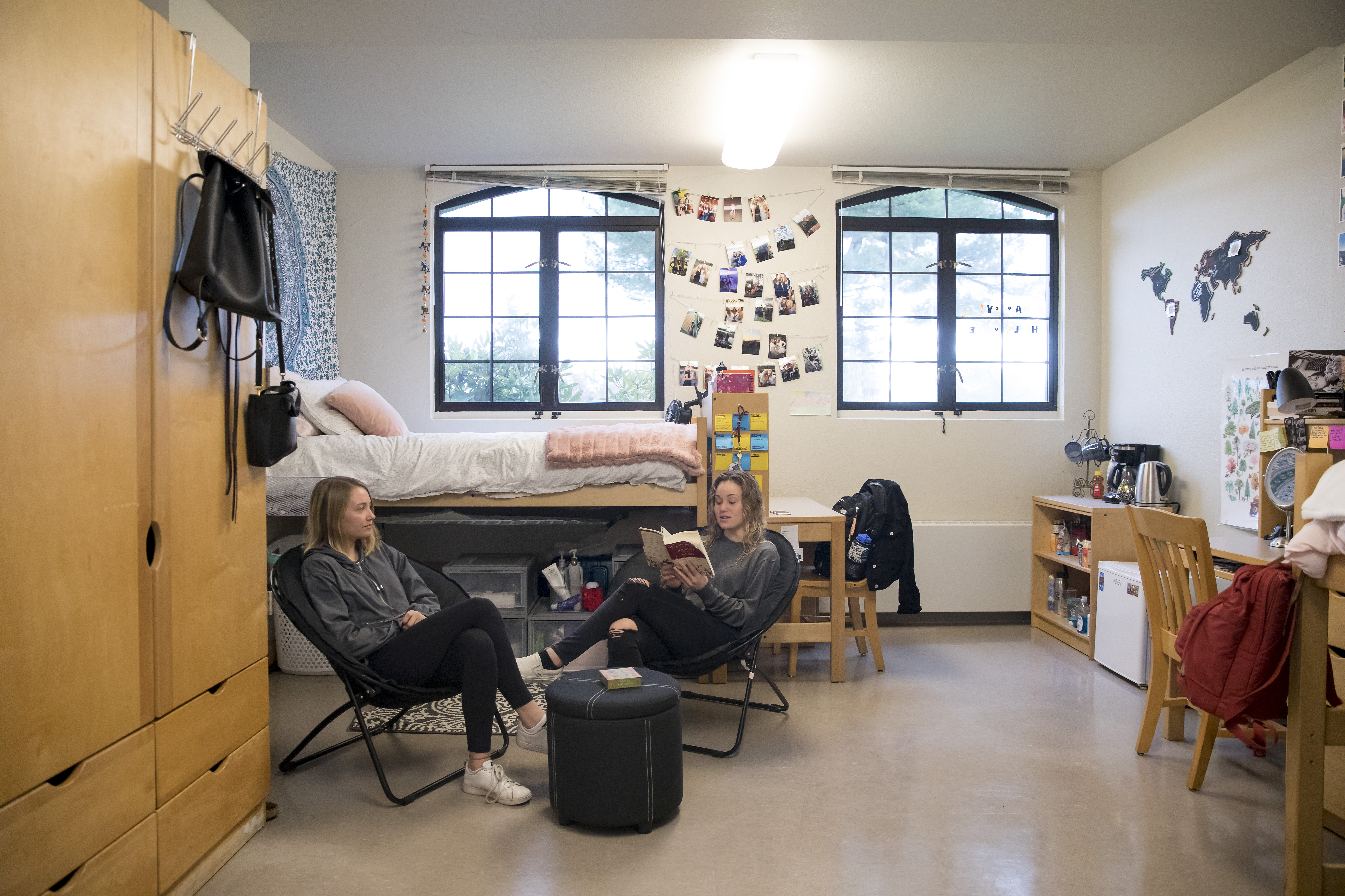 Two students in a residence hall room