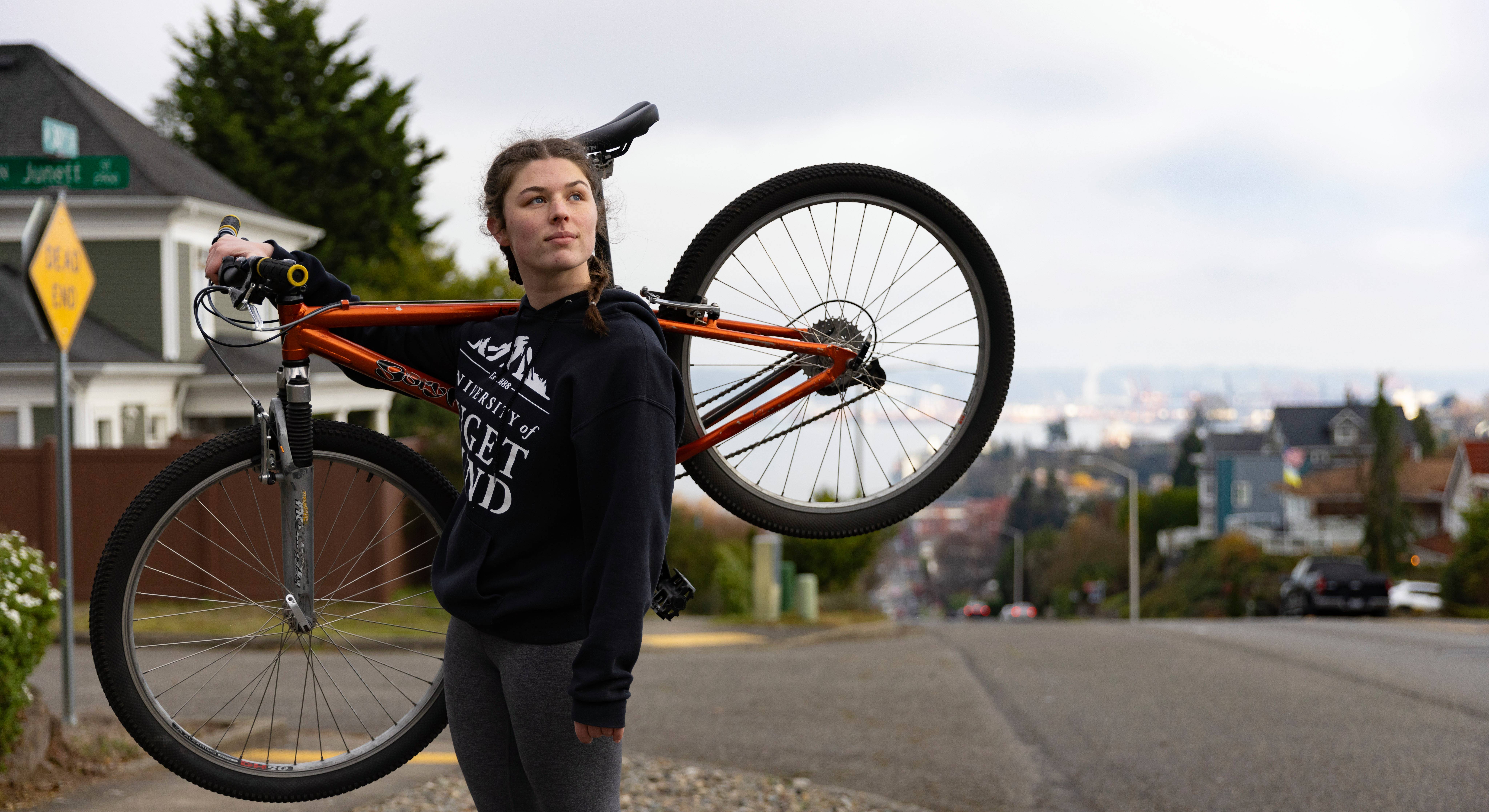 Emma Smith '25 with her bike in Tacoma