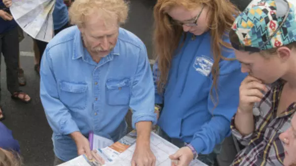 People looking at a document