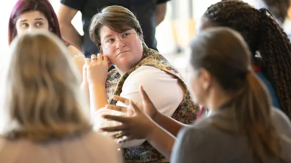 Students in an Education class engage in discussion.