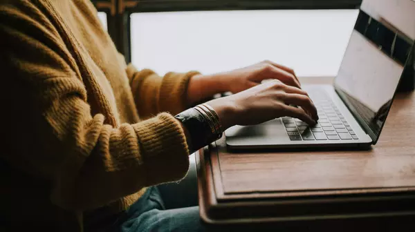 Person working on a laptop