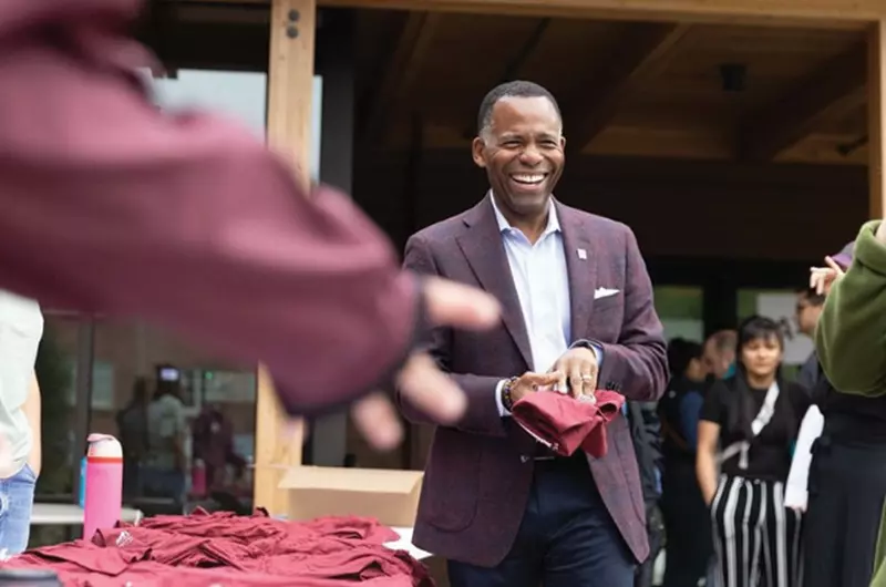 President Crawford smiling at an orientation event.