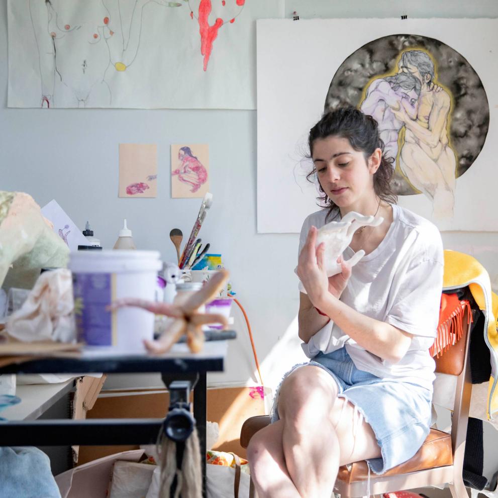 Student works on a ceramics project