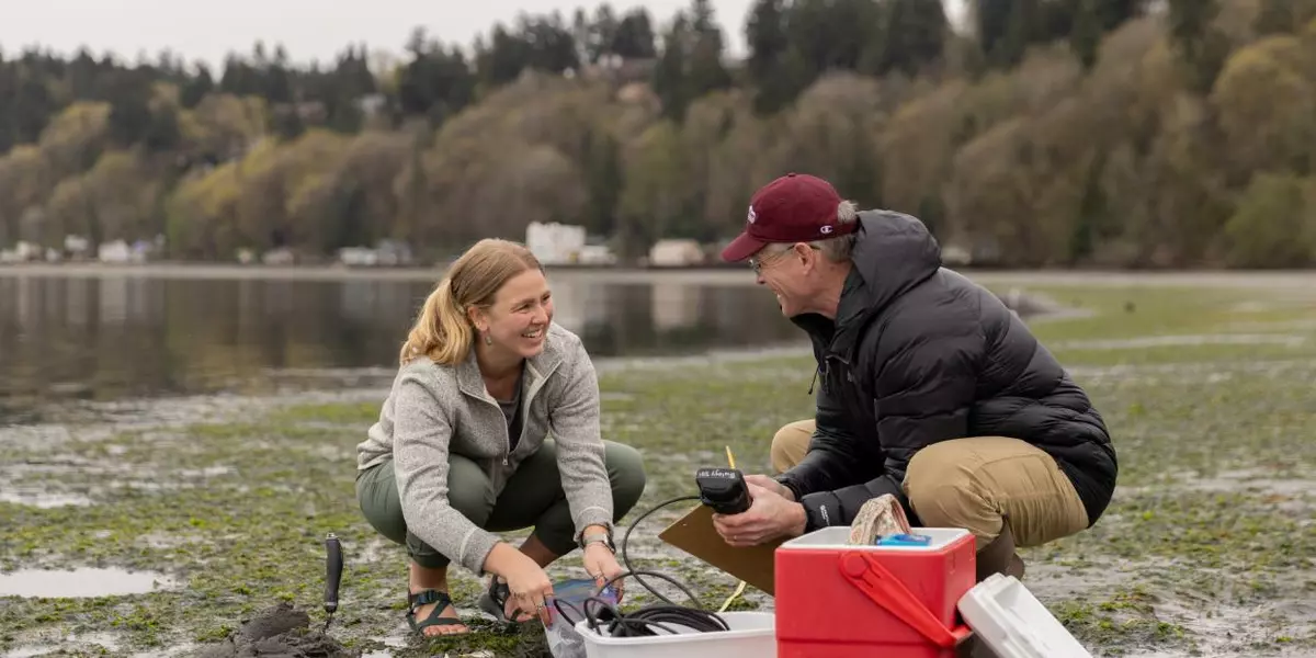 Megan Mooney '23 and Professor Joel Elliott conduct research at Dash Point State Park.