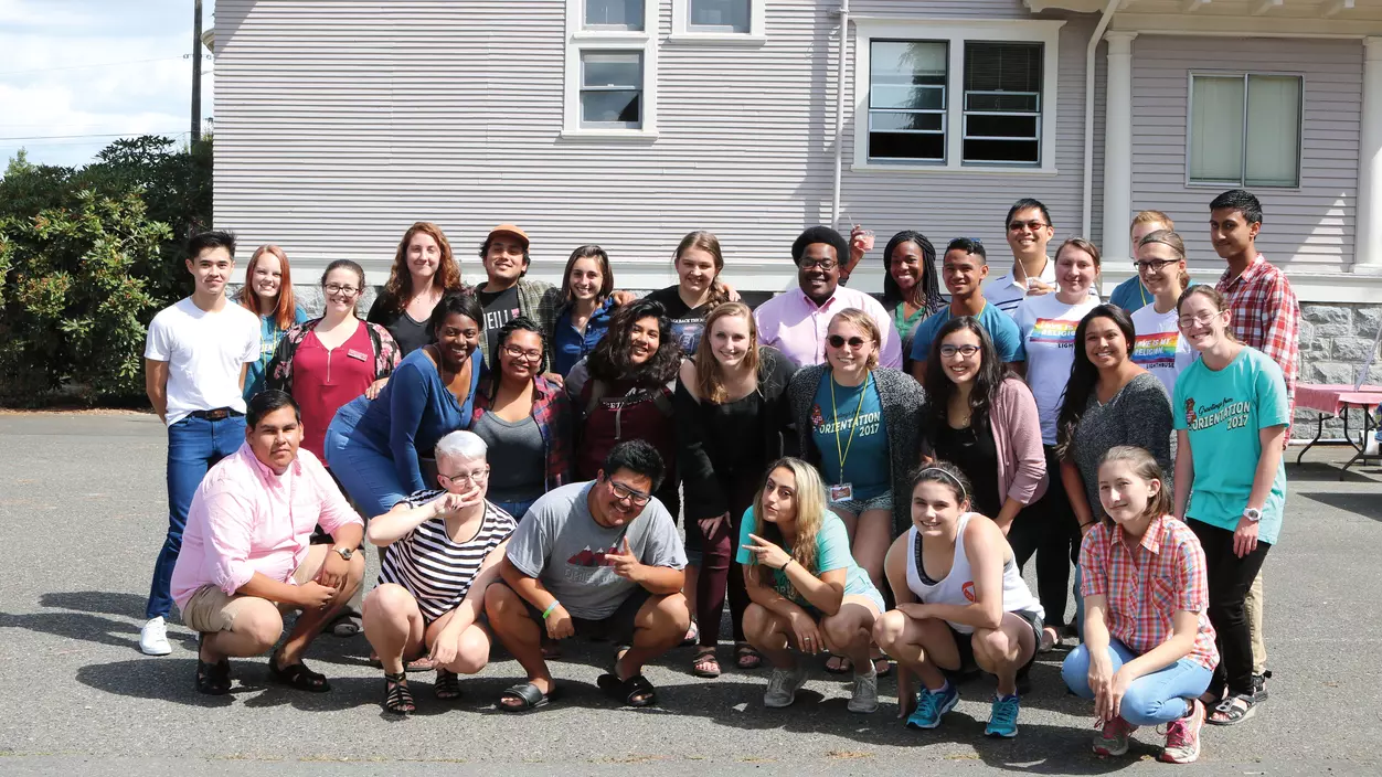 A group photo of people outside in the sun