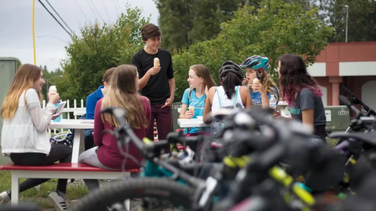 A group of young people eating ice cream