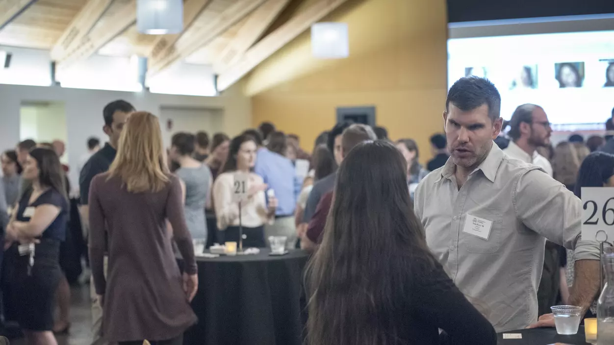 People talking at a networking event