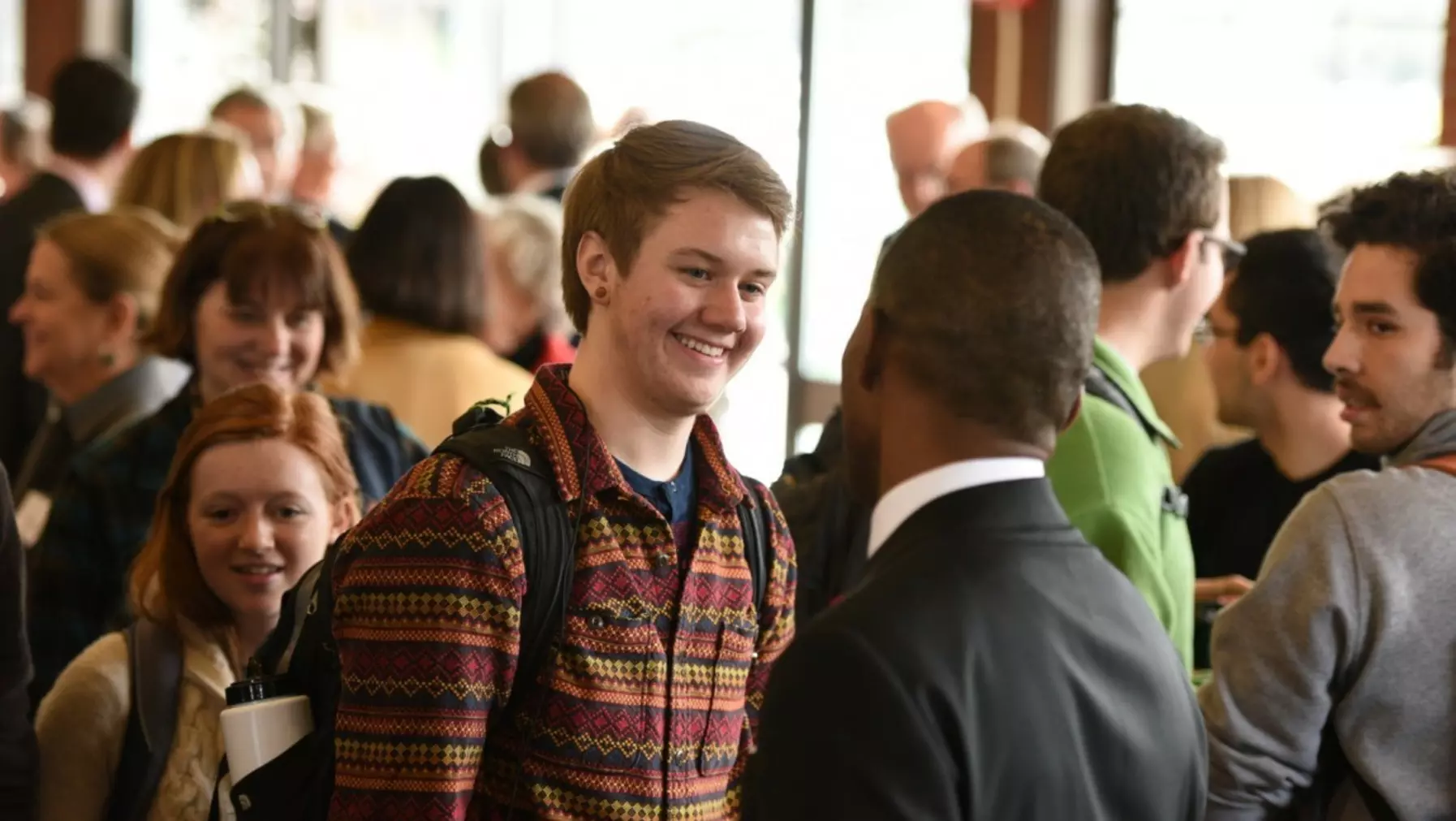 President-elect Isiaah Crawford greets students