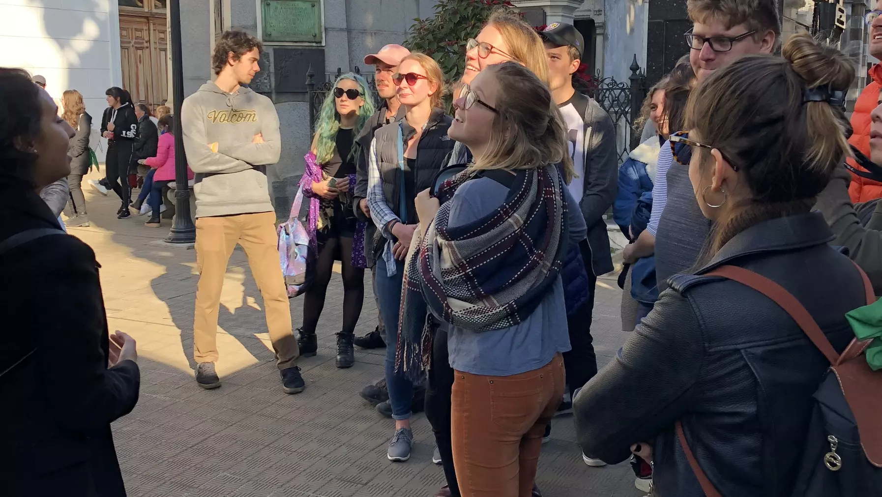 A group of people looking at historic architecture