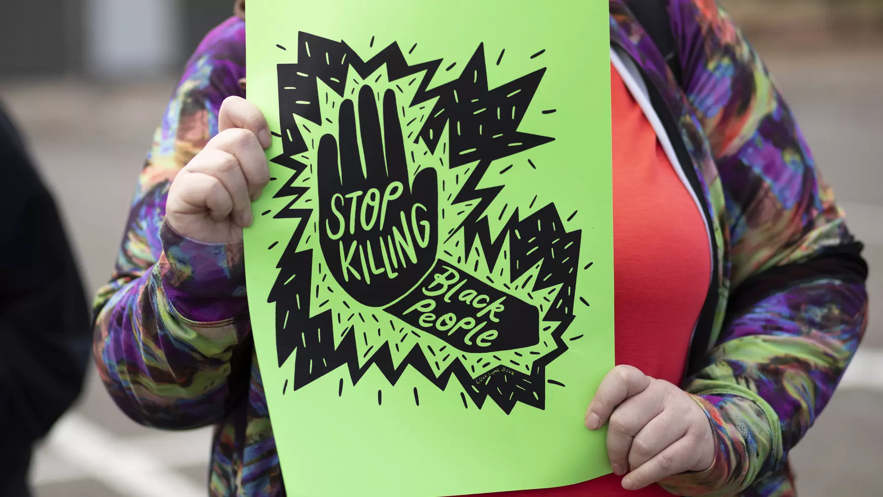 Protester holding a banner