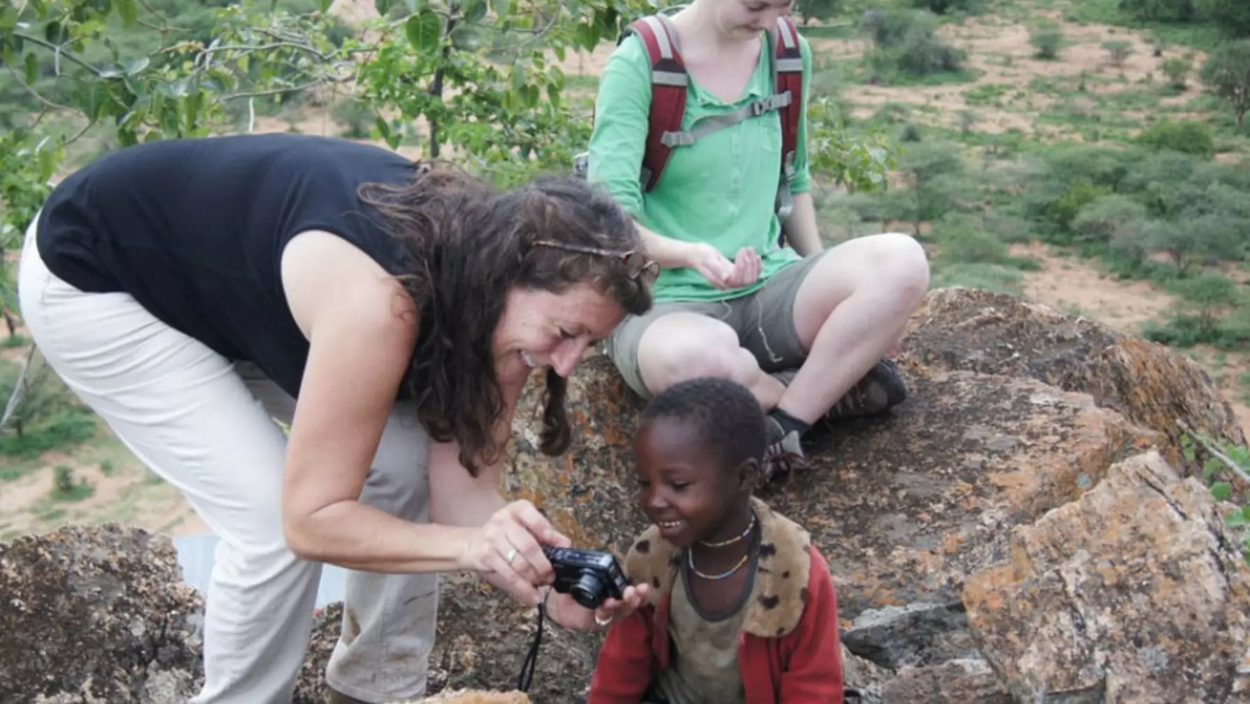 woman showing camera