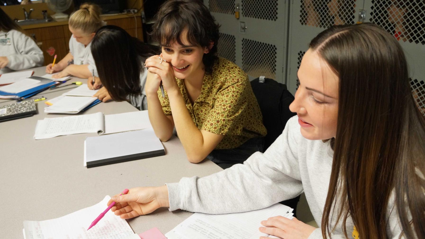 A group of people working together at a table