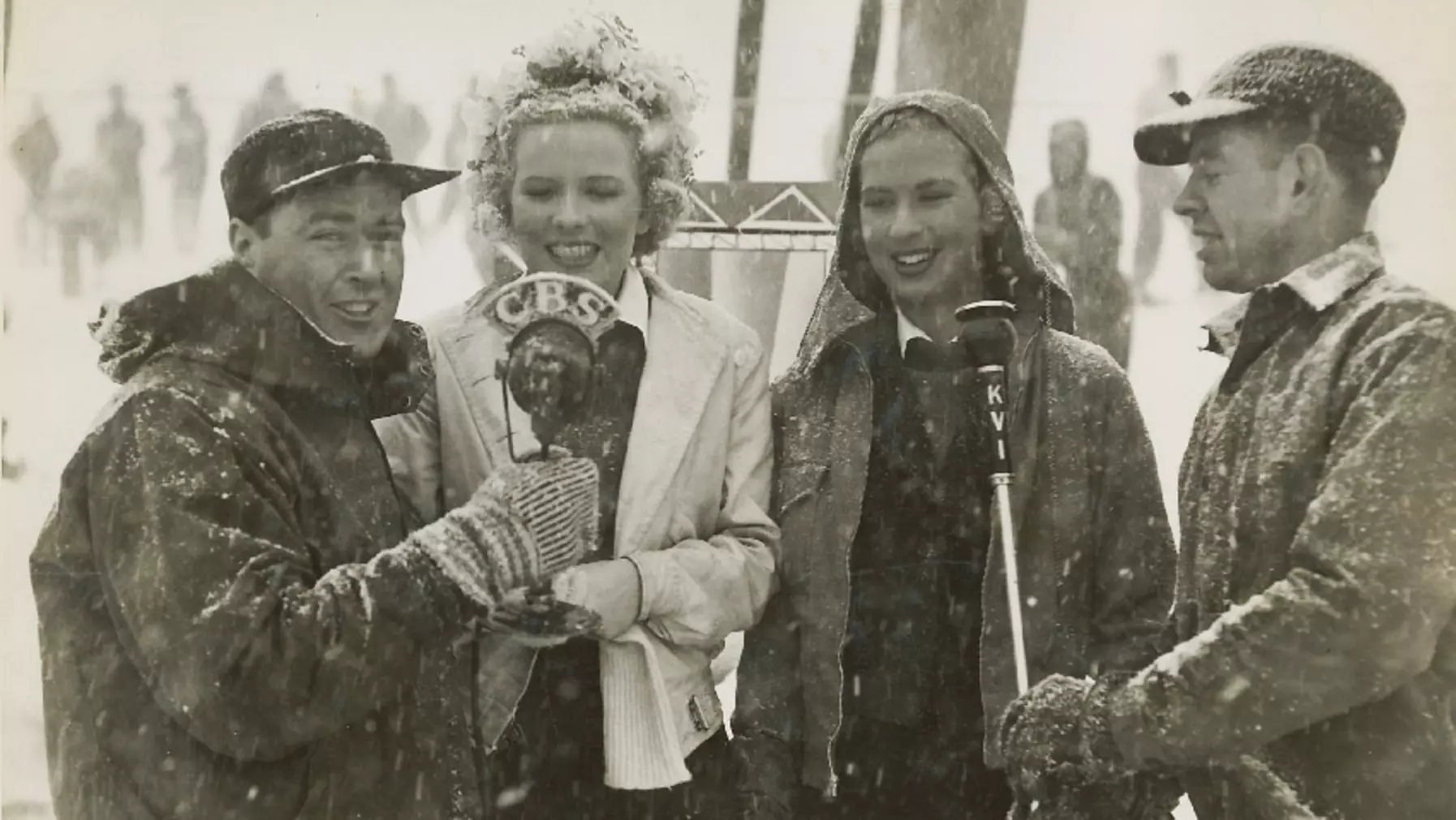 Gretchen Kunigk Fraser ’41 is interviewed by two members of the media, including radio station KVI, which at the time was based in Tacoma. It’s now licensed in Seattle.