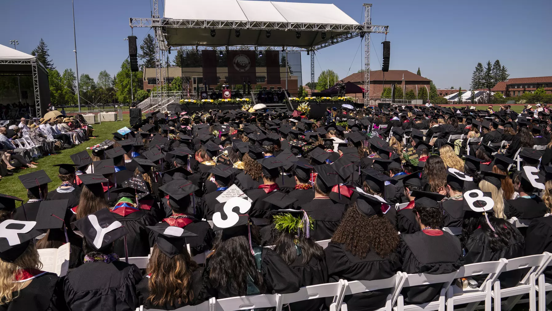 Graduates awaiting their turn to cross the stage.