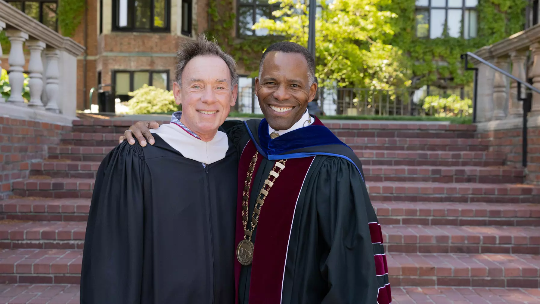 President Crawford and Chair of the Board of Trustees Robert Pohlad P'07 prepare for Commencement.