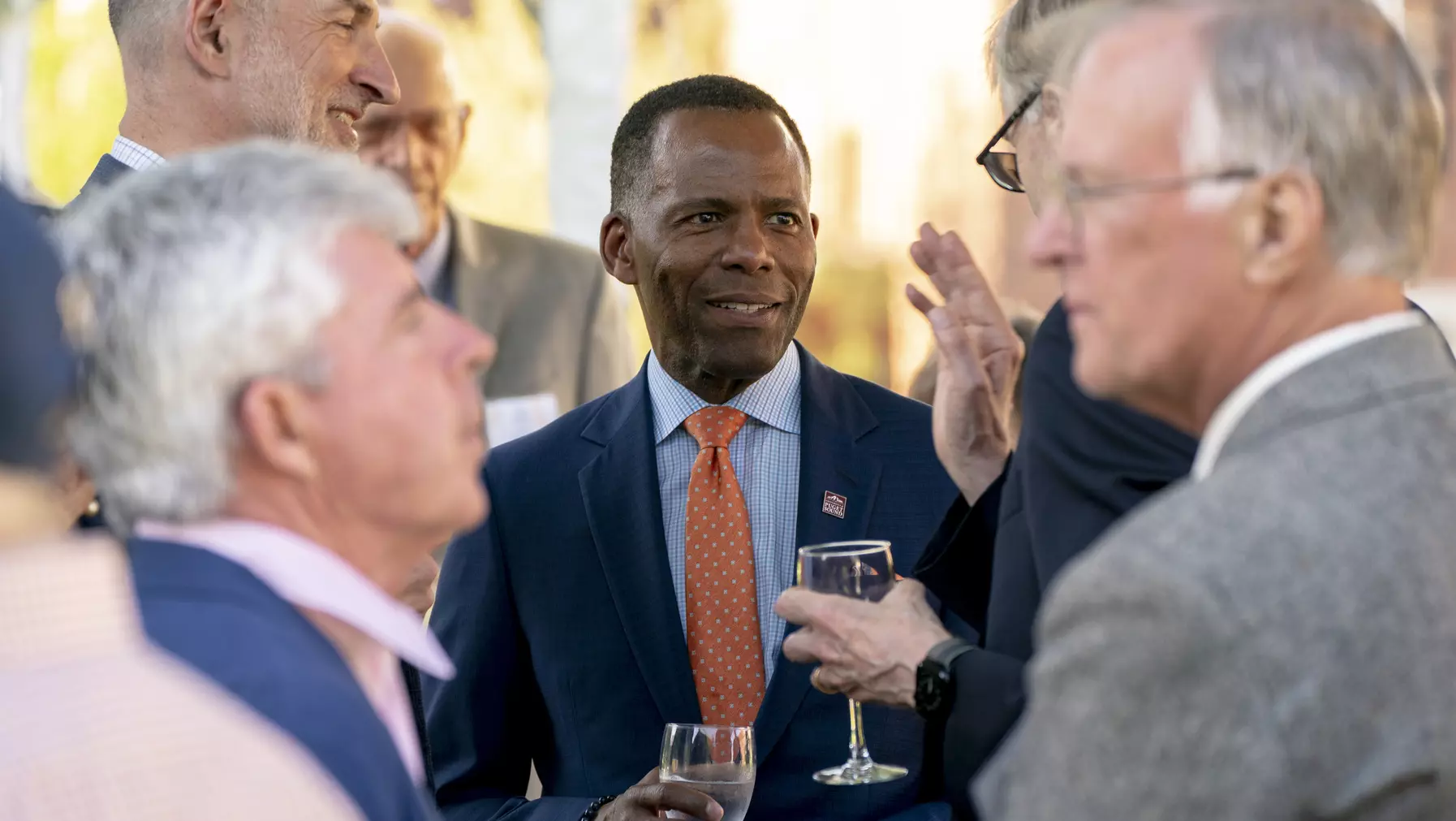 President Crawford, trustees, and other attendees enjoy the reception celebrating the 100th anniversary of the Jones Hall groundbreaking.