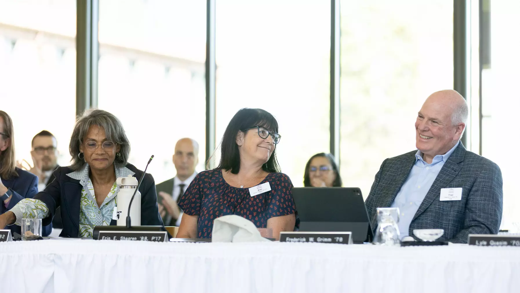 Trustees Karen Jenkins-Johnson '82, Erin Shagren '88, P'17, and Fred Grimm, '78 share a laugh. 