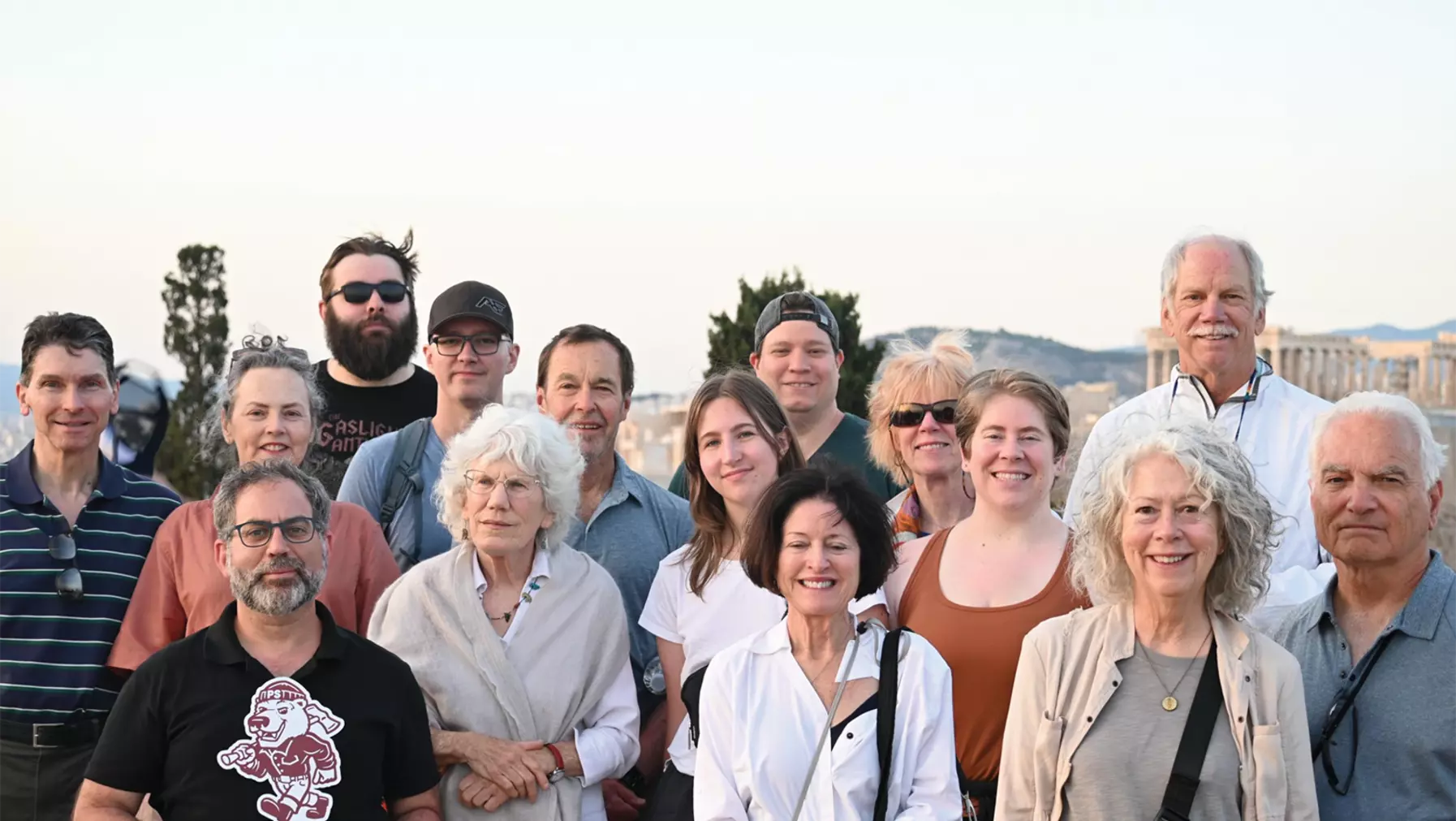 Alumni tour group to Greece poses for a group photo.