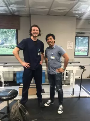 Two people in an occupational therapy clinic room